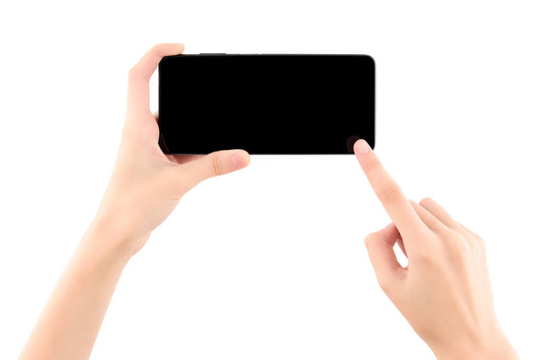 Woman hand holding black smartphone with blank screen isolated on white background. - Valokuva, kuva