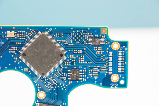 A close-up shot of an electronic motherboard on a white background. - Photo, image