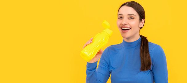 Woman isolated face portrait, banner with copy space. young girl with sport plastic bottle. healthy lifestyle. water balance in body. drinking per day - Photo, Image