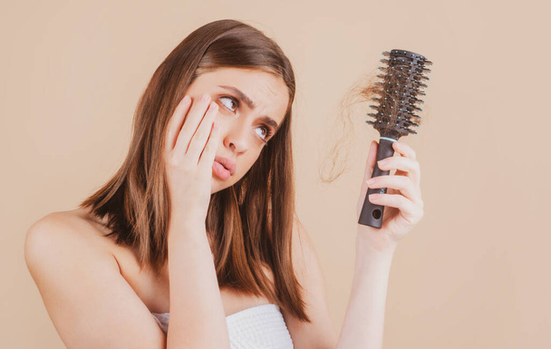 Sad woman with hair loss problem worried about hair loss - Foto, immagini