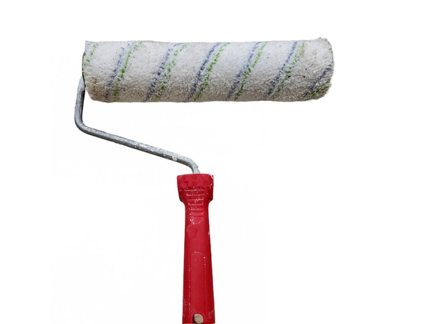A roller with a red handle isolated on a white background - Photo, Image