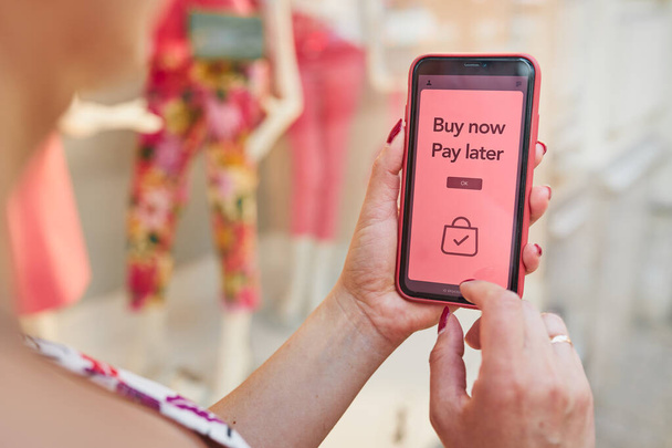 BNPL Buy now pay later online shopping service on smartphone. Online shopping. Paying after delivery. Complete the payment after purchase at no added cost. Payment after credit check. Easy way to shop online. Afterpay service - Valokuva, kuva