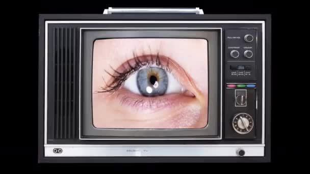 Uma coleção de televisores em mudança com um olho na tela - Filmagem, Vídeo