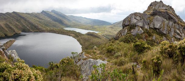 A Panoramic view of the Andean glacial Siecha Lakes (Lagunas de Siecha) under cloudy sky, Chingaza Natural National Park in Cundinamarca, Colombia - Фото, изображение