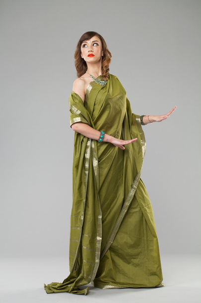 Young pretty woman in indian green dress - Fotografie, Obrázek