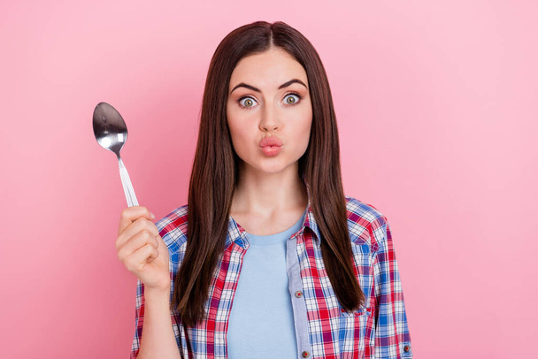 Portrait of positive funny lady pout lips cant wait to ear yummy dessert addicted to sweets isolated on pink color background. - Foto, imagen