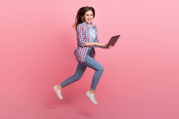 Full body photo of charming beautiful businesswoman analyze information isolated on pink color background. - Foto, imagen