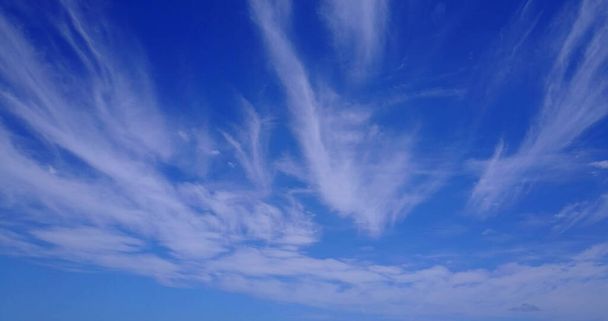 A beautiful view of a blue sky with clouds - Zdjęcie, obraz