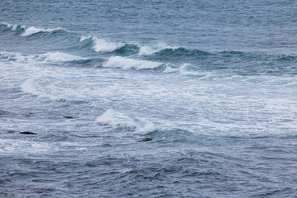 Sea wave splash over the rock beach  - Zdjęcie, obraz