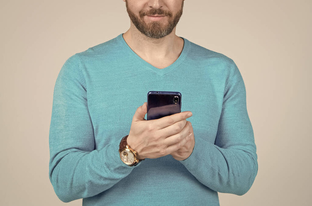 cropped man with beard chatting online on smartphone, communication. - Photo, Image