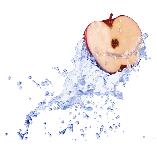 Red apple in juice stream - Foto, imagen