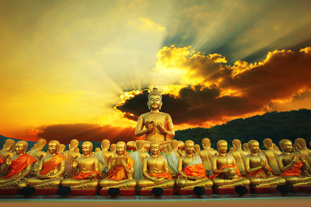 golden buddha statue in buddhism temple thailand against dramati - Photo, Image