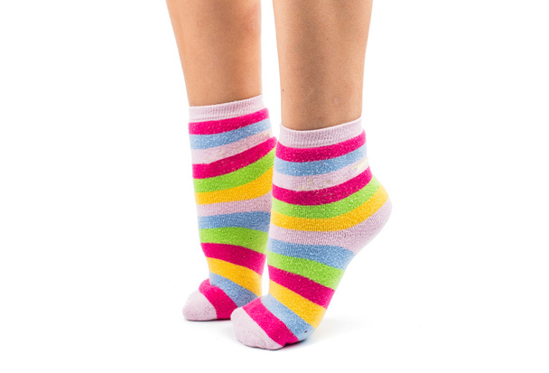 striped socks on the feet  - Photo, Image
