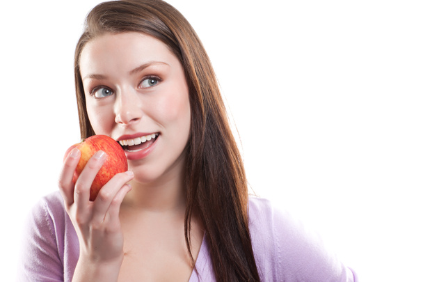 Woman eating apple - Фото, зображення