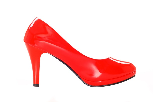 Червоний пофарбований високий каблук
 - Фото, зображення