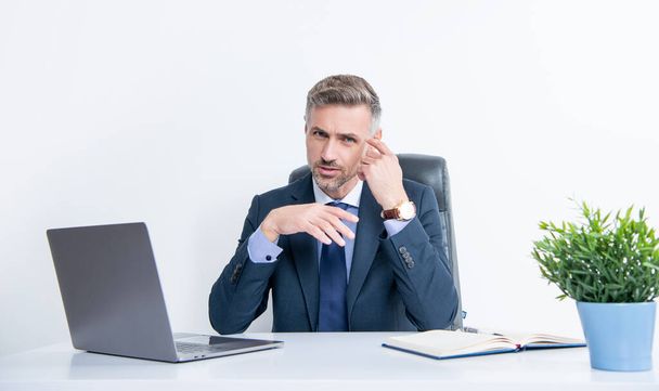 thinking businessman sitting in business office with laptop. - Photo, Image