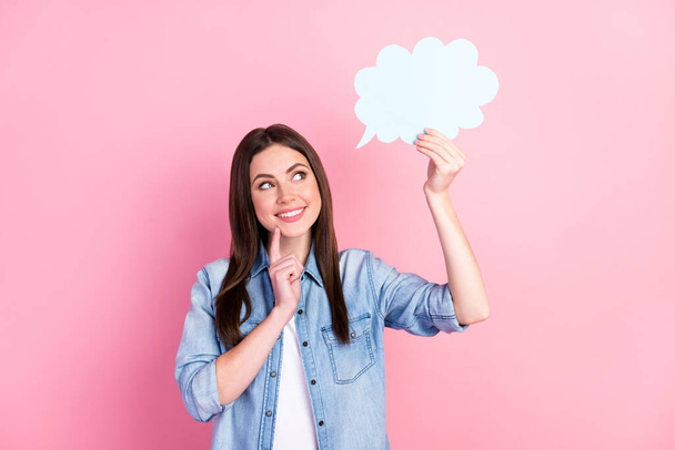 Portrait of attractive cheerful minded girl holding cloud copy space thinking isolated over pink pastel color background. - Fotografie, Obrázek