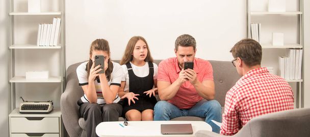 Family psychologist. Psychotherapy with family. phone addicted father mother and child at family psychologist, therapy. - Photo, Image