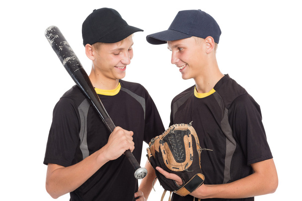 Twin brothers guys in the form of a baseball game - 写真・画像