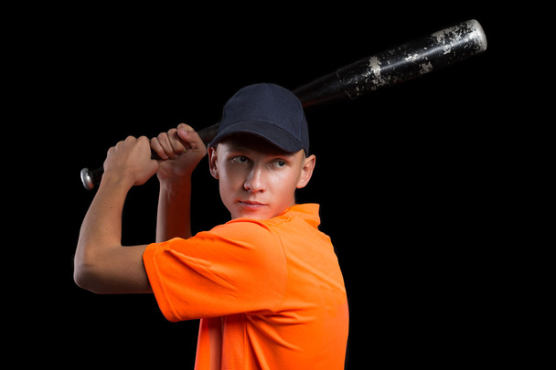 Baseball player to bat preparing to strike - Foto, imagen
