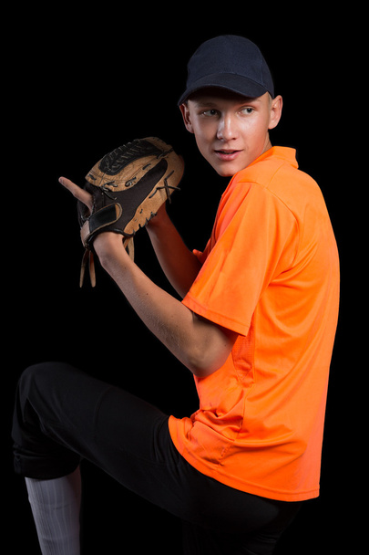 Baseball player getting ready to throw the ball - Foto, imagen