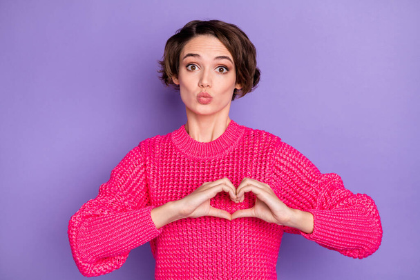Photo of young girl pouted lips show gesture fingers heart love valentine day isolated over violet color background. - Foto, Imagen