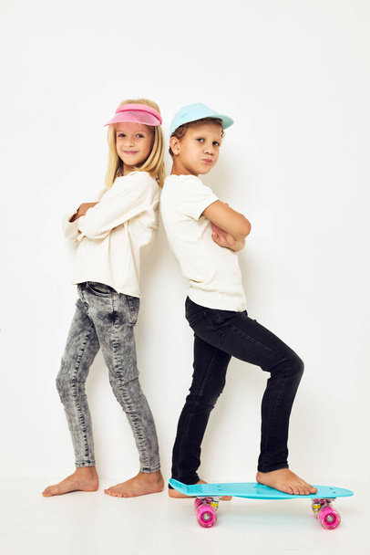 Couple of adorable stylish children posing games fun studio. High quality photo - Photo, Image