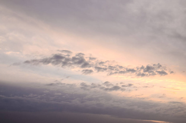 Cloudscape, Colored Clouds at Sunset near the Ocean - Fotoğraf, Görsel