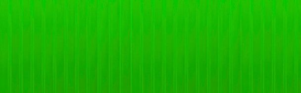 Panorama of Green clear plastic sheet with stripes pattern and background seamless - Photo, Image