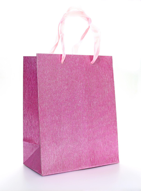 Pink shopping bag isolated on a white background - Fotoğraf, Görsel