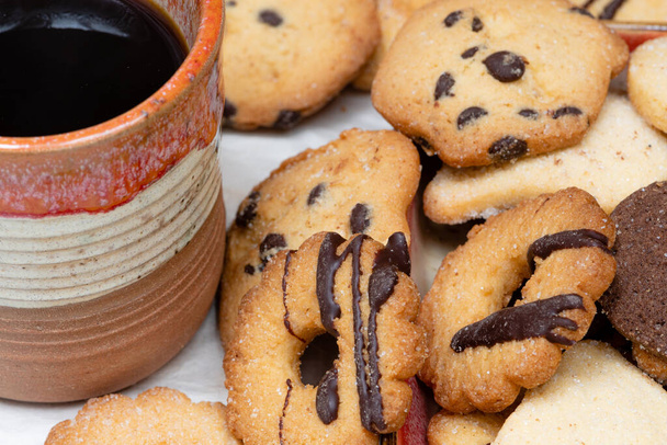 Homemade milk and chocolate cookies for a delicious snack - Photo, Image