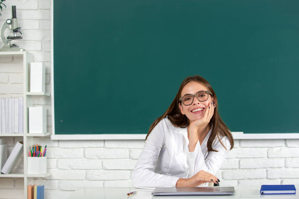 Female student on lesson lecture in classroom at high school or college. - Foto, Imagen