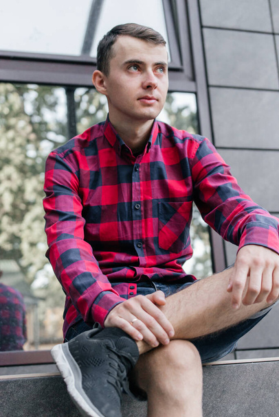 guy in a red checkered shirt - 写真・画像