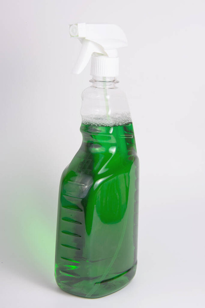 Spray bottle cleaner window on the white background - Fotoğraf, Görsel