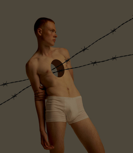 Contemporary art collage. Conceptual image with young man and hole into body sharp wire coming through. Torn feelings . Concept of inner world, feelings, psychology, emotions, creativity - Фото, изображение