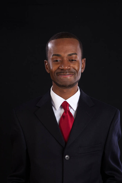 Handsome black businessman with a pleasing smile - Foto, immagini