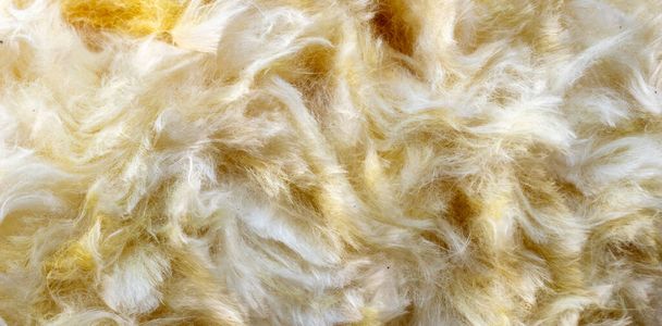 lana minerale gialla con una texture visibile - Foto, immagini