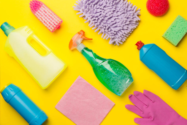 Many different house cleaning products on color background, top view. - 写真・画像
