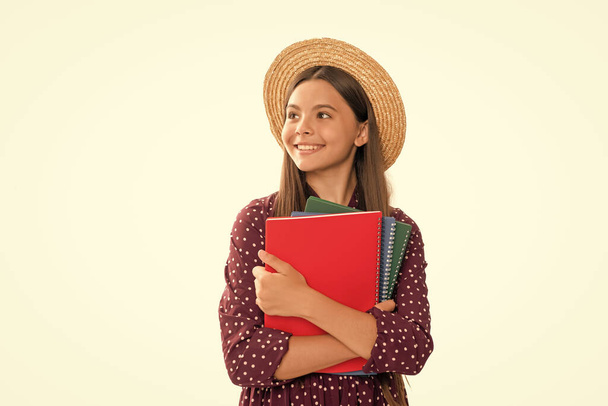 teenage student. high school education. schoolgirl with copybook. happy teen girl with notebook. back to school. child in straw hat ready to study. childhood development. kid going to do homework. - Photo, Image