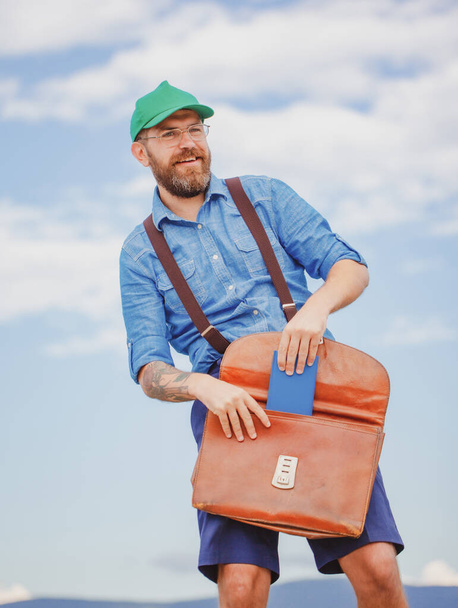Crazy business man nerd holding bag outdoors. Meme funny emotions - Fotografie, Obrázek