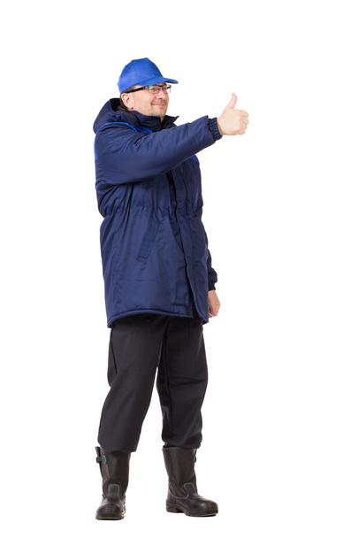 Worker in coat with thumb up - Photo, image
