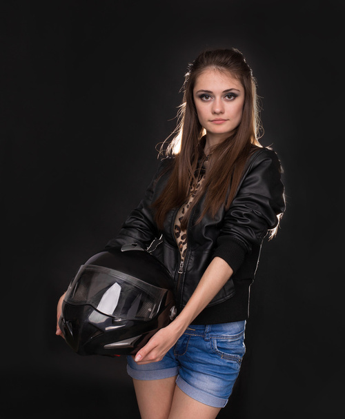 Woman with motorbike helmet - 写真・画像