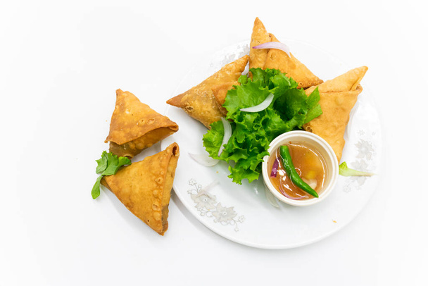 deep fry Samosa with chili and onion isolated on white background, - Photo, Image