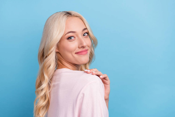 Photo portrait blonde woman curly hair smiling happy in casual outfit isolated pastel blue color background. - Fotoğraf, Görsel