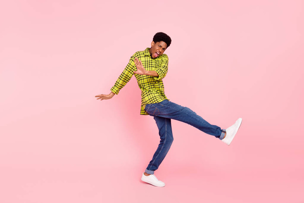 Full size photo of happy funky crazy afro american man dance enjoy smile isolated on pink color background. - Zdjęcie, obraz