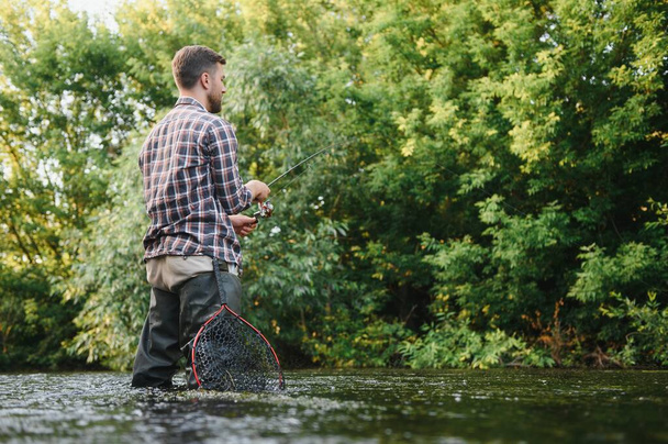 Trout fishing on mountain river. - Fotografie, Obrázek