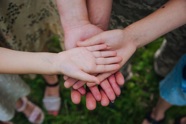 hands of children and parents large - Foto, Bild
