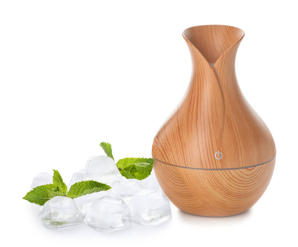 Aroma oil diffuser, ice cubes and mint on white background - 写真・画像