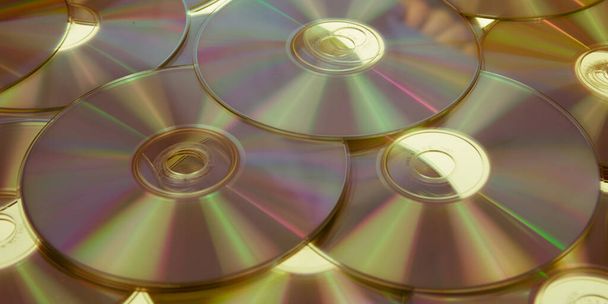 kultainen kompakti levyt tausta kulta levy cdrom Cd tai dvd Blue ray - Valokuva, kuva