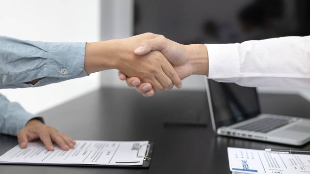 Employer or HR department welcomes new employees, Shaking hands with congratulations or achieving business and income success, selection of new staff representatives, Qualified, Hand shake concept. - Photo, Image